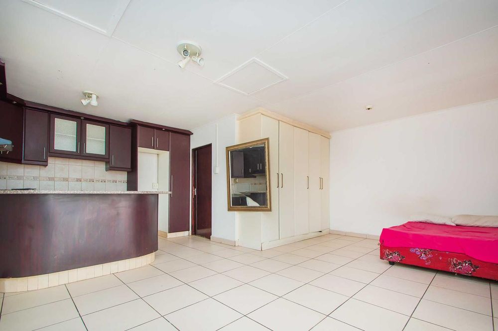 Garage converted cottage with open reception , bedroom and kitchen