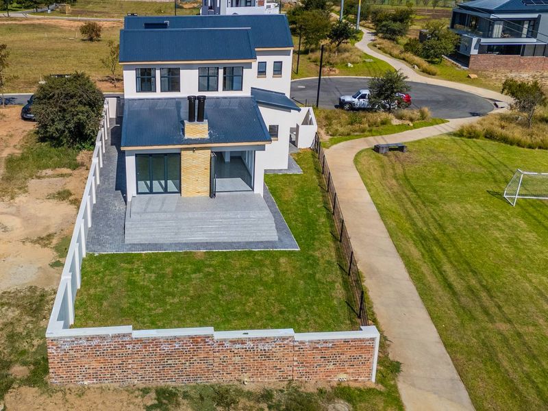 Brand New Contemporary Family Home in Helderfontein Estate - Photo 4