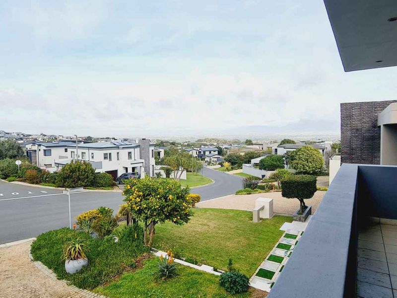 Elegant Family Living with Spectacular De Grendel Wine Farm Views - Photo 8