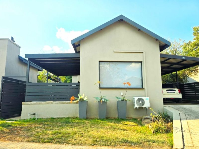 Modern Lock-Up-and-Go Living with Mountain Views in Secure Zandspruit Valley - Photo 4