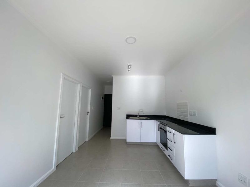 First-Floor 2-Bedroom Apartment with Balcony & Estate Amenities - Photo 4