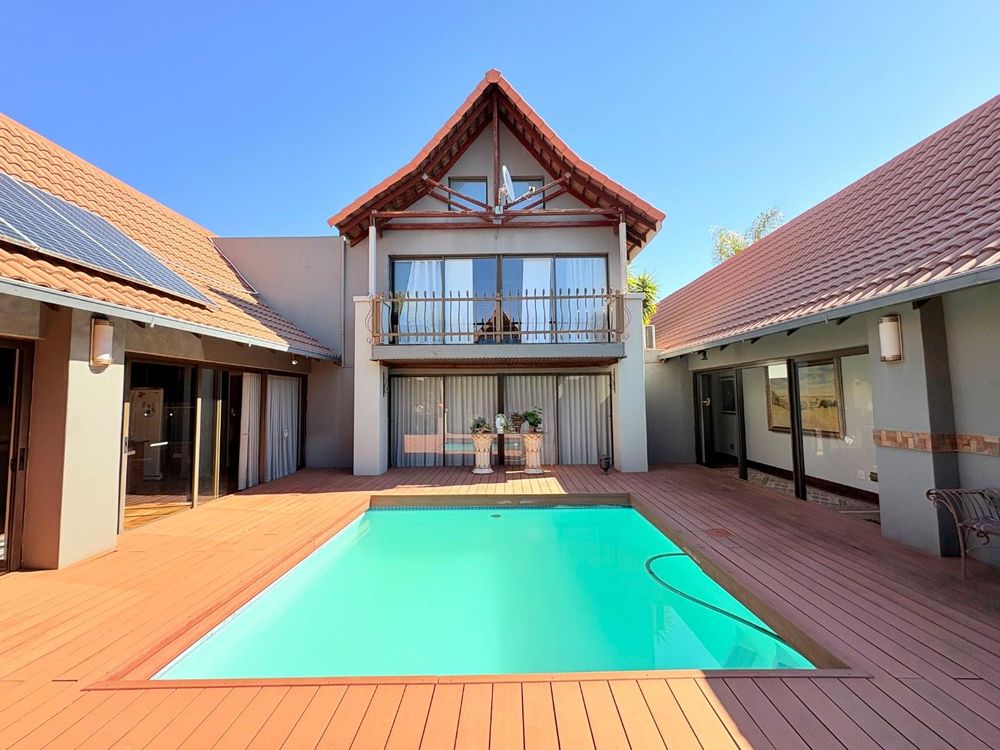 Swimming pool in the middle of the house.