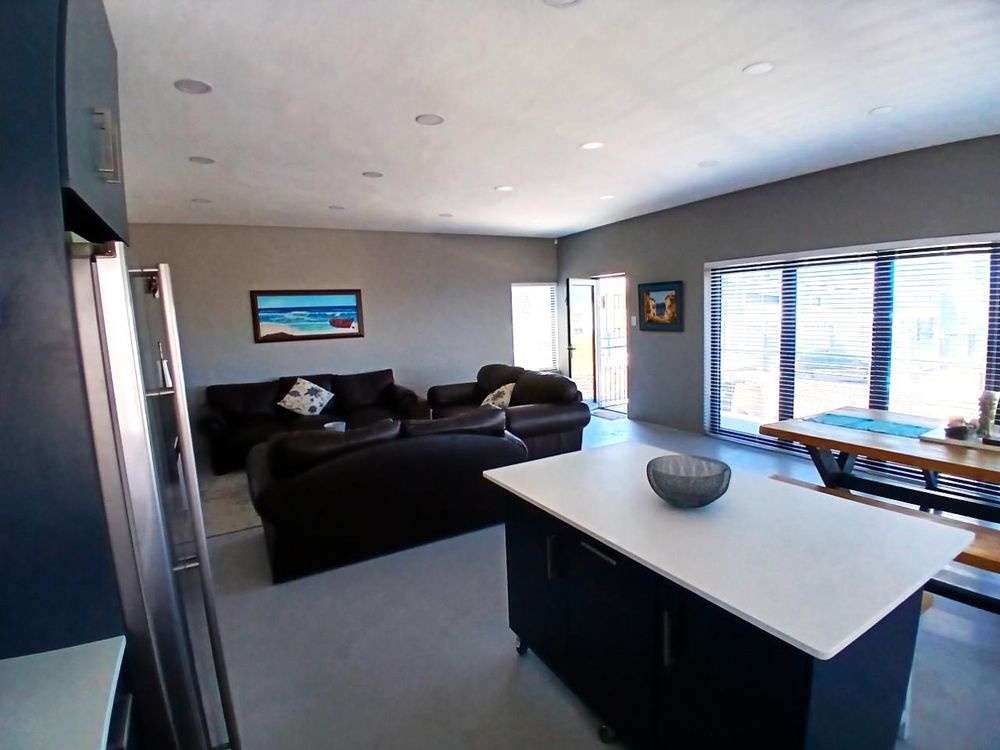 Same Living Area &Kitchen; as from Kitchen. Front door at back. Stack doors on right.