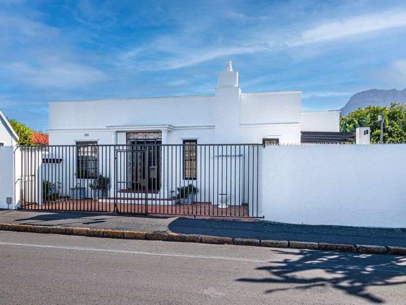 Stylish, Sun-Drenched Family Home in the Heart of Harfield Village - Photo 2