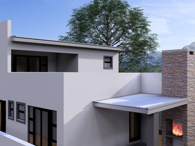 Modern rear exterior view featuring a stone-clad outdoor fireplace, covered patio area, and balcony with mountain views.