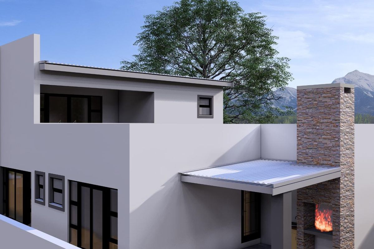 Modern rear exterior view featuring a stone-clad outdoor fireplace, covered patio area, and balcony with mountain views.