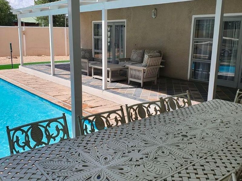 Exclusive 4-Bedroom Home with Pool & Study in Klein Windhoek - Photo 3