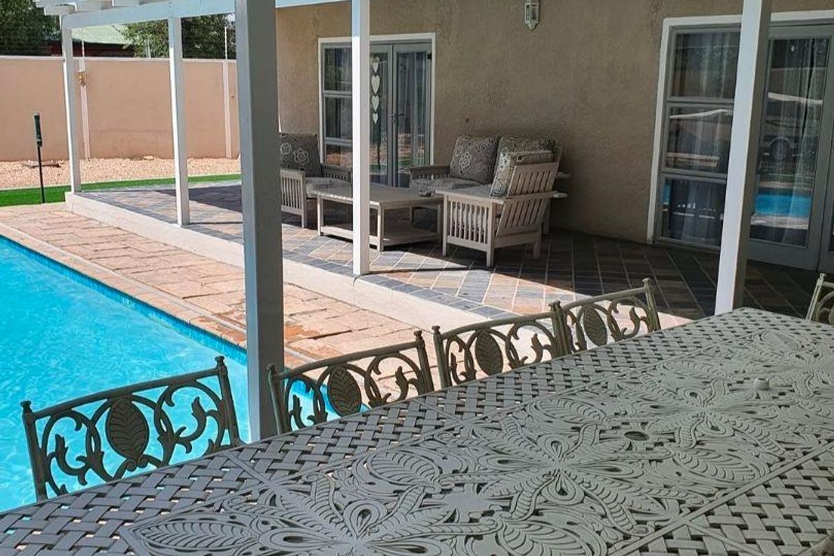 Exclusive 4-Bedroom Home with Pool & Study in Klein Windhoek - Photo 3