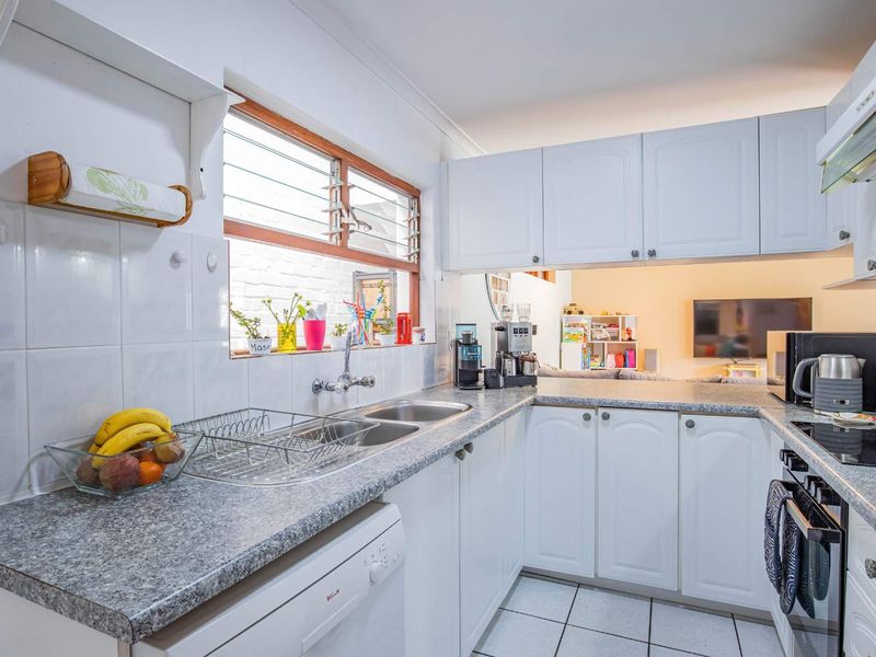 Charming North-Facing Double-Storey Home with Sunny Garden & Pool - Photo 10