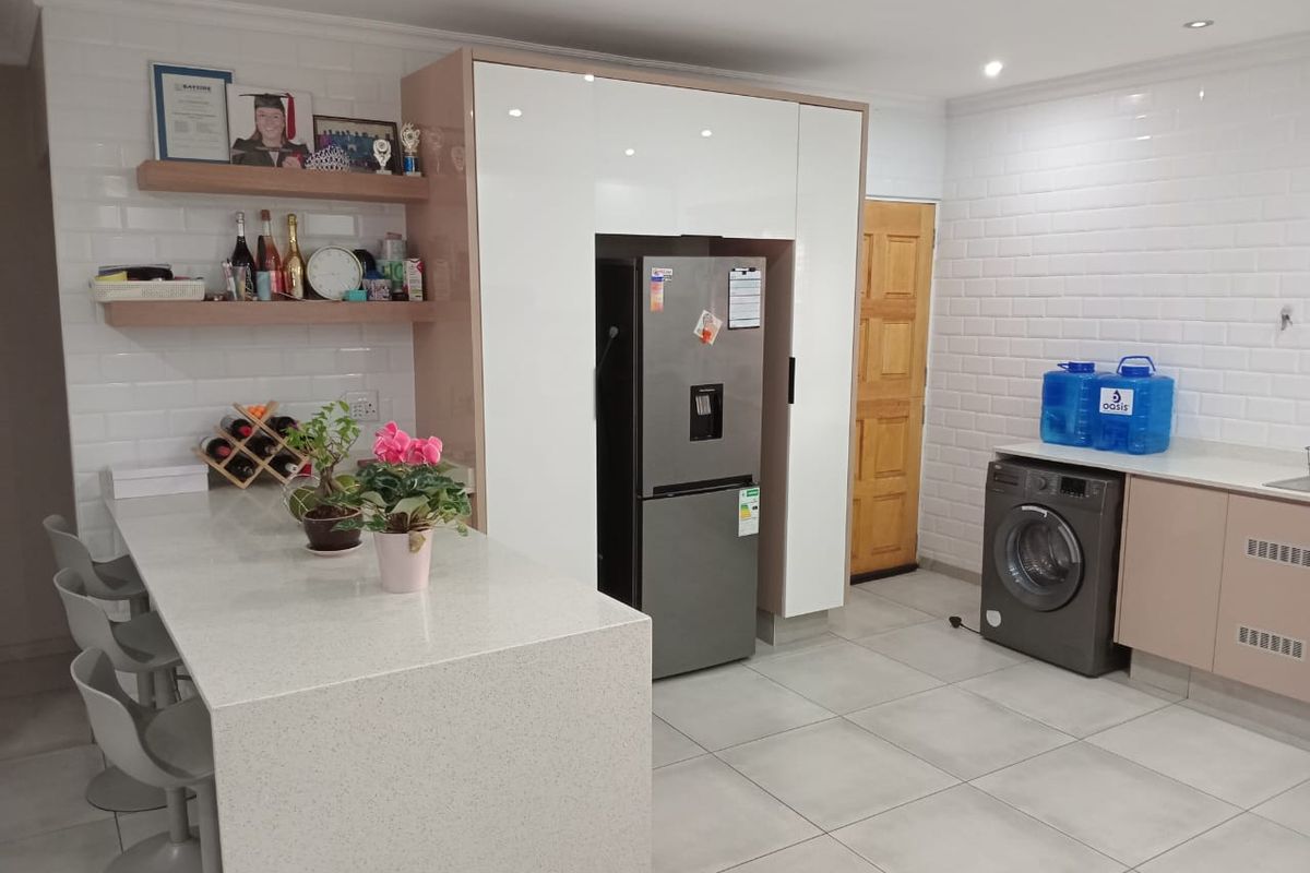 Step into comfort and modern convenience with this beautifully presented 3-bedroom home, perfectly designed for easy living. Fully tiled throughout, this home o - Photo 3