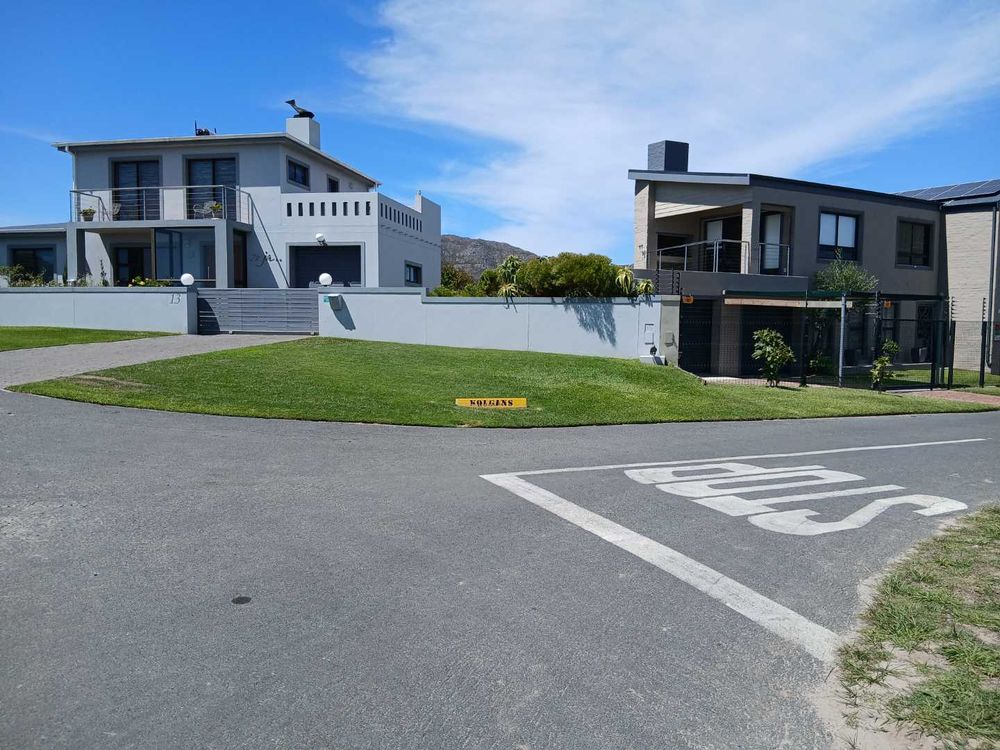 Front View of 2 Houses in front of us. See the gap in between the 2 Houses.