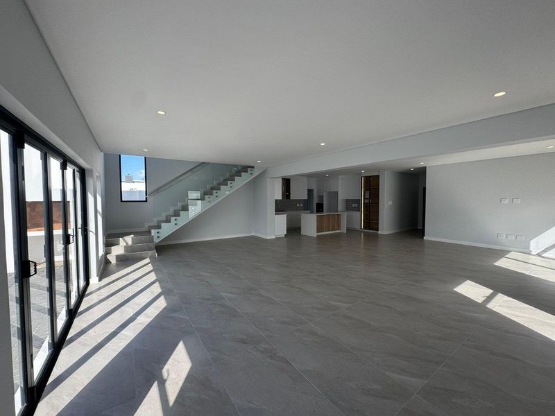 Modern 5-Bedroom Family Home with Exceptional Space & Seamless Indoor-Outdoor Living in Sandown - Photo 9