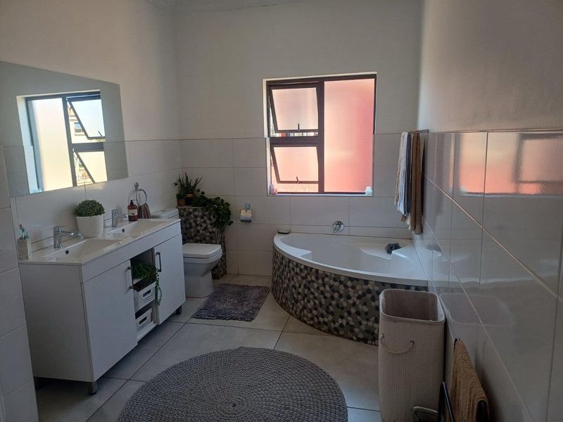 Stylish Double-Storey Cluster with Granny Flat & Poolside Charm - Photo 7