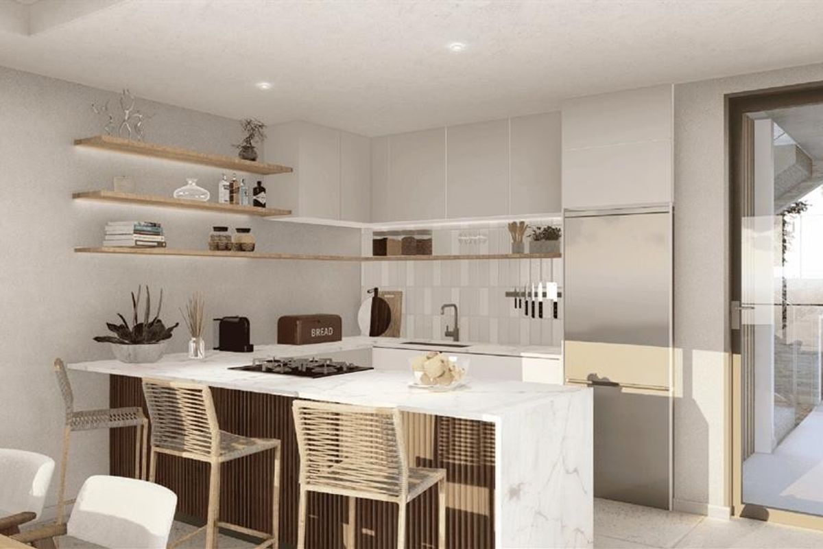 Modern kitchen featuring a marble-look breakfast bar, integrated cabinetry, floating timber shelving, and a sleek tiled backsplash with built-in gas hob.
