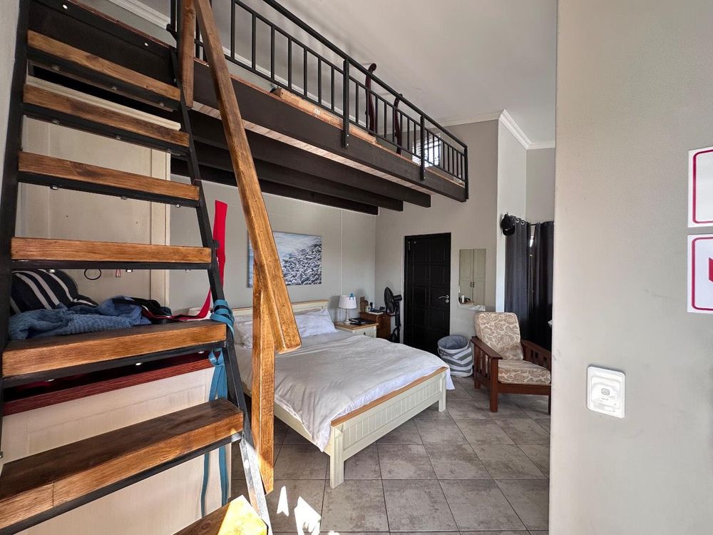 Flatlet 2 with own entrance, loft, kitchenette, ensuite bathroom and balcony.