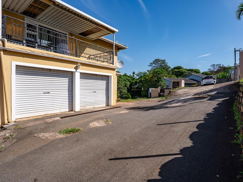 Spacious Hillside Townhouse with Scenic Views & Great Potential - Photo 4