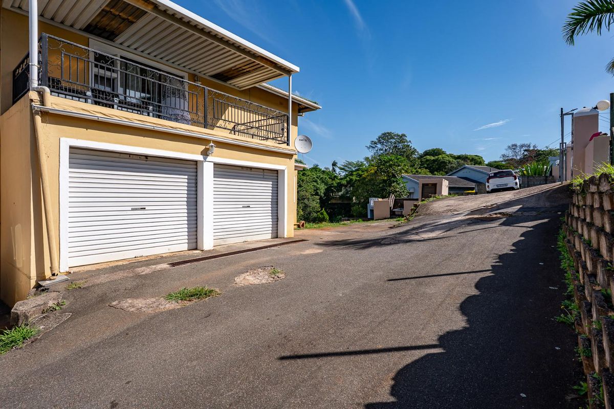 Spacious Hillside Townhouse with Scenic Views & Great Potential - Photo 4