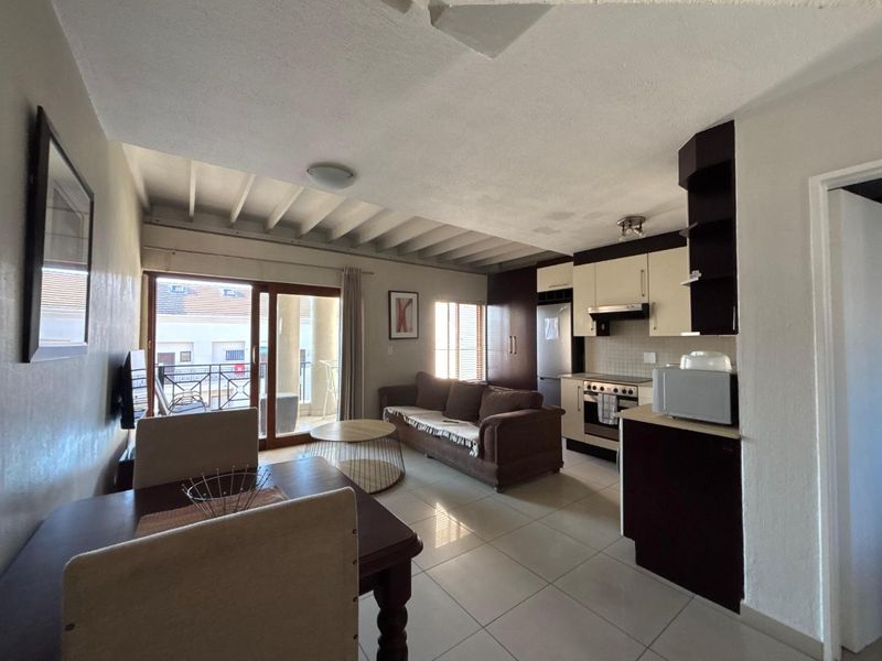 A STUNNING ONE BEDROOM FURNISHED DUPLEX - Photo 1
