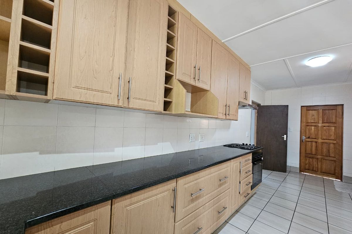 Four-Bedroom Family Home with Pool and Braai in Arboretum - Photo 3