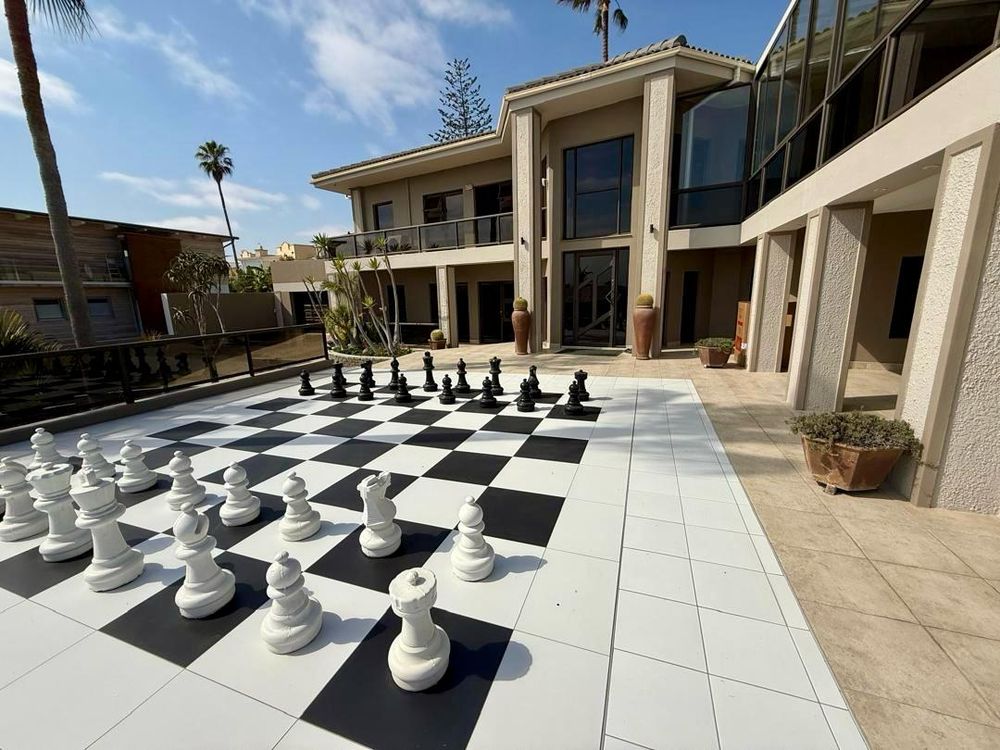 Large patio with man-sized chessboard
