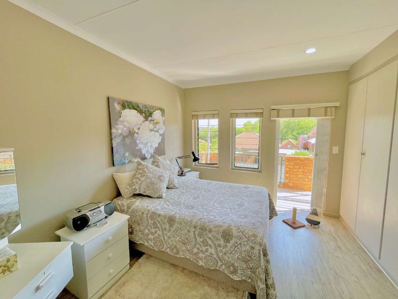 **Charming 3-Bedroom Home with Separate Flatlet, Backup Power, and Low Levies in Faeriedale Security Village, Faerie Glen** - Photo 4