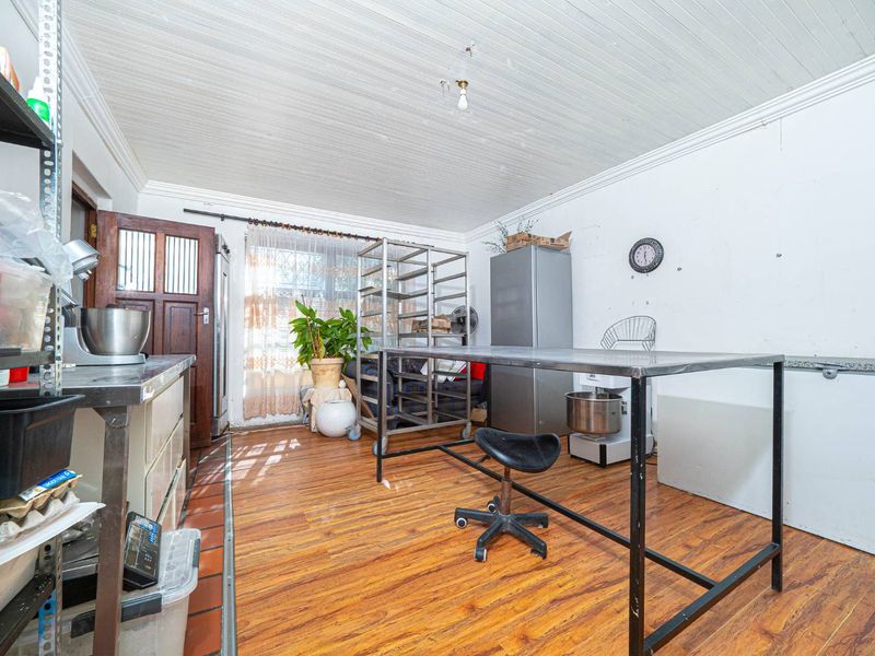 This Versatile Double-Storey property offers the perfect opportunity for renovation and customization with independent Upper and Lower Living (Homes) - Photo 3