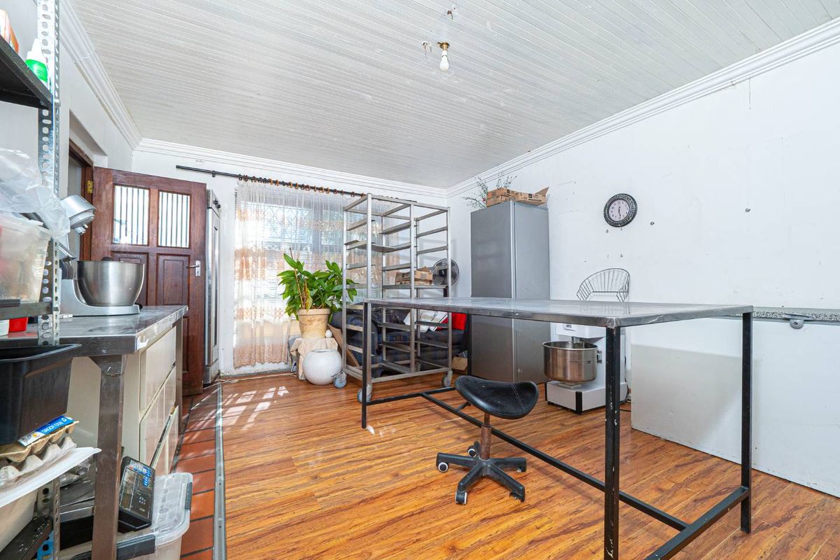 This Versatile Double-Storey property offers the perfect opportunity for renovation and customization with independent Upper and Lower Living (Homes) - Photo 3