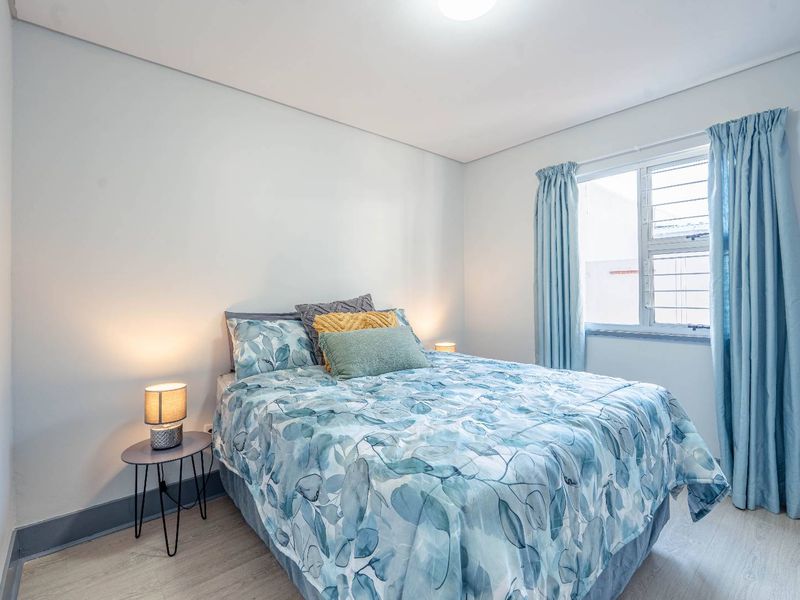 Rare Find! Spacious Single-Level Townhouse in Secure, Pet-Friendly Complex - Photo 8