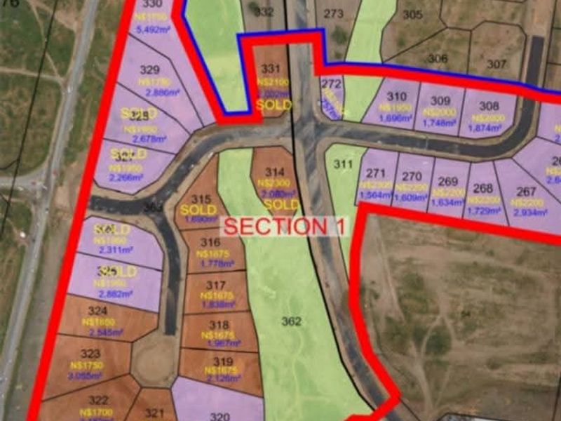 An aerial site layout plan showing subdivided industrial plots and road infrastructure within the Lafrenz industrial area.