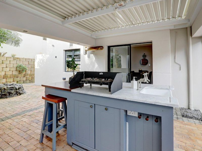 An exceptional opportunity to own a beautiful, modern home offering secure, stylish living in a sought-after, well-managed security estate! - Photo 6