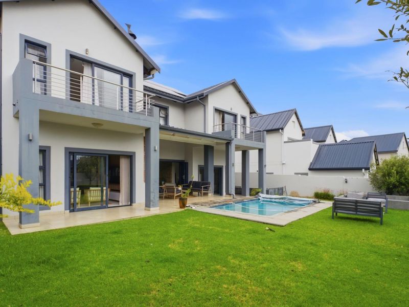 Modern Four Bedroom Home For Rental in Waterfall Country Village Estate - Photo 1