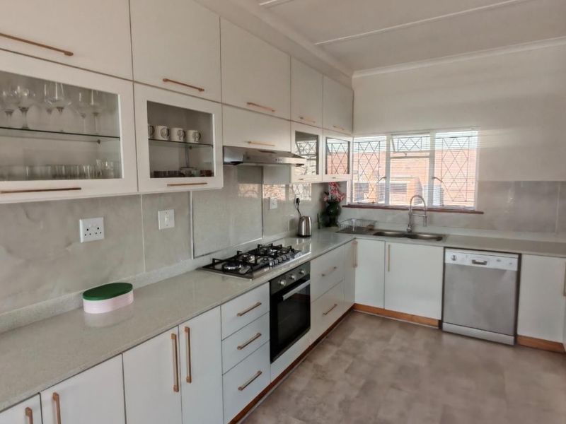Three-Bedroom Ocean View Starter Home with Inland views nestled in Spacious Garden - Photo 6