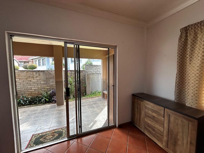 OFFERS WELCOME! Move-In Ready Gem: Spacious 3-Bedroom in Secure Village! - Photo 8