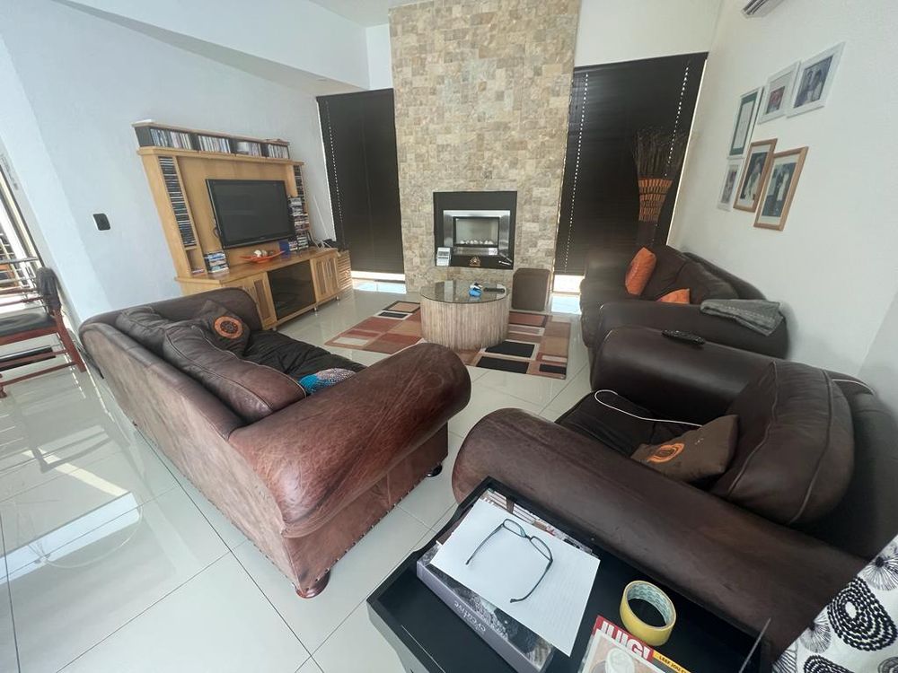 Lounge area on first floor with gas heater.