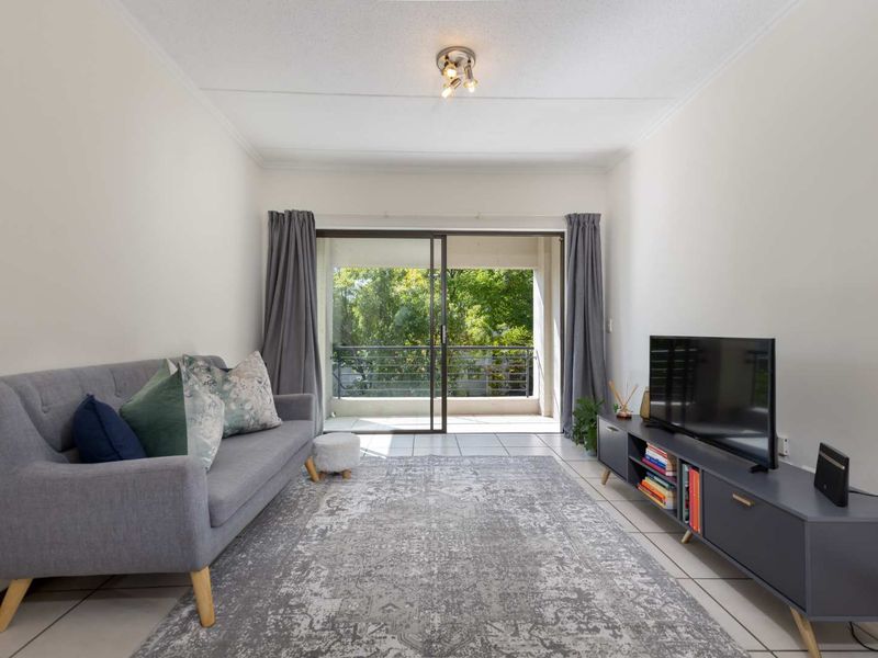 A WELL- POSITIONED MIDDLE FLOOR UNIT IN SOUGHT AFTER TEQUILA SUNRISE - Photo 7