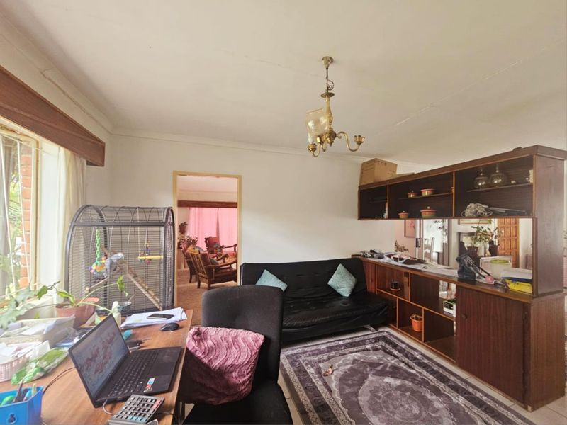 **Charming Facebrick Home with Income-Generating Flatlet** - Photo 9