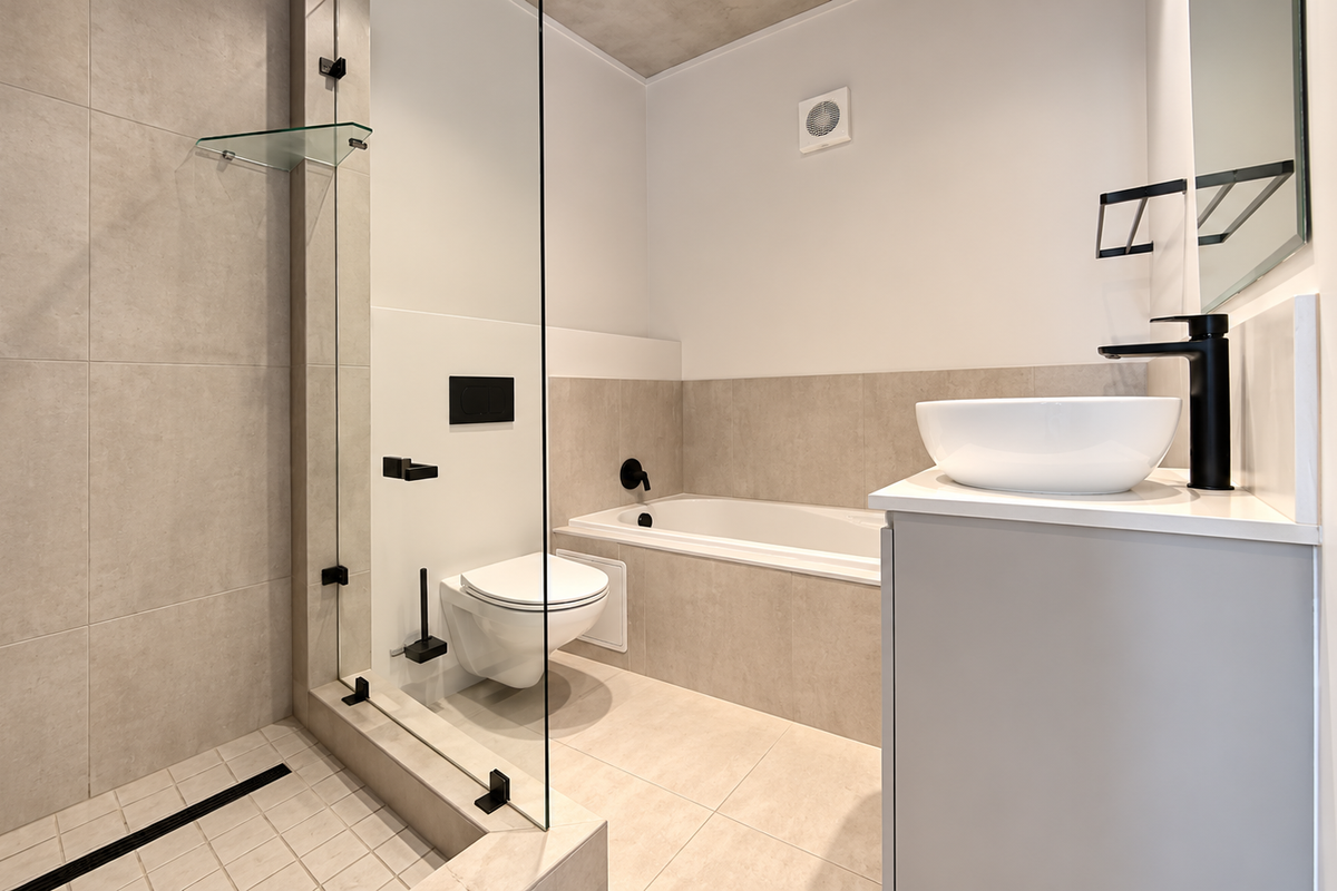 Modern bathroom featuring a walk-in shower with glass screen, built-in bathtub, wall-hung toilet, and a vanity with vessel sink and contemporary black fixtures.