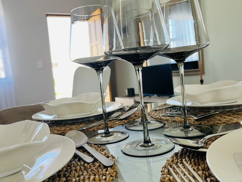 A close-up view of a dining table setting in a residential living space.