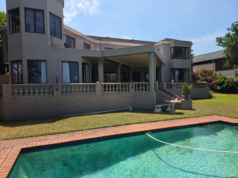 HENDRA - 4 BEDROOM WELL LOVED FAMILY HOME IN UMHLANGA - Photo 2