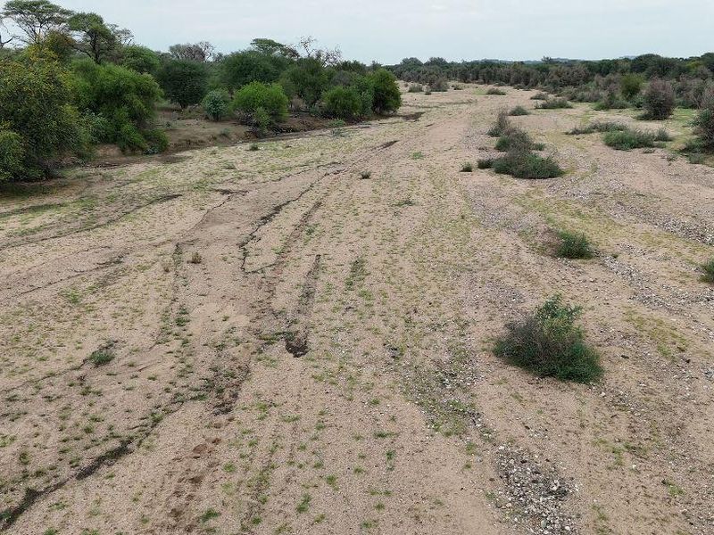 Prime Plot for Sale with strong water! 11 Hectares Nestled near the banks of Swakop River, just 8km West of Okahandja! Your Perfect Opportunity Awaits! - Photo 4
