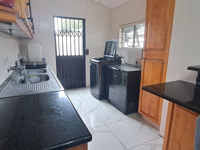 Step into this spacious and well-appointed 4-bedroom home, designed for comfortable family living and effortless entertaining. - Photo 7