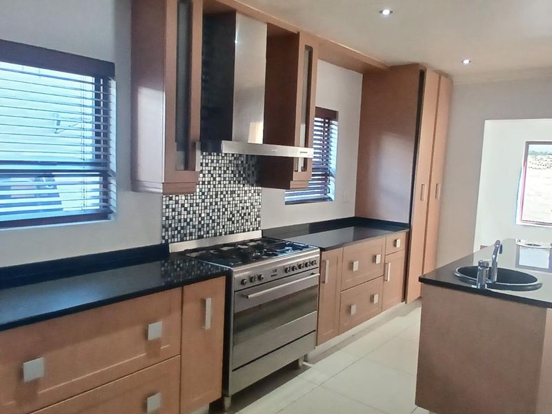 Modern Elegance in a Secure and Sought-After Estate - Photo 2