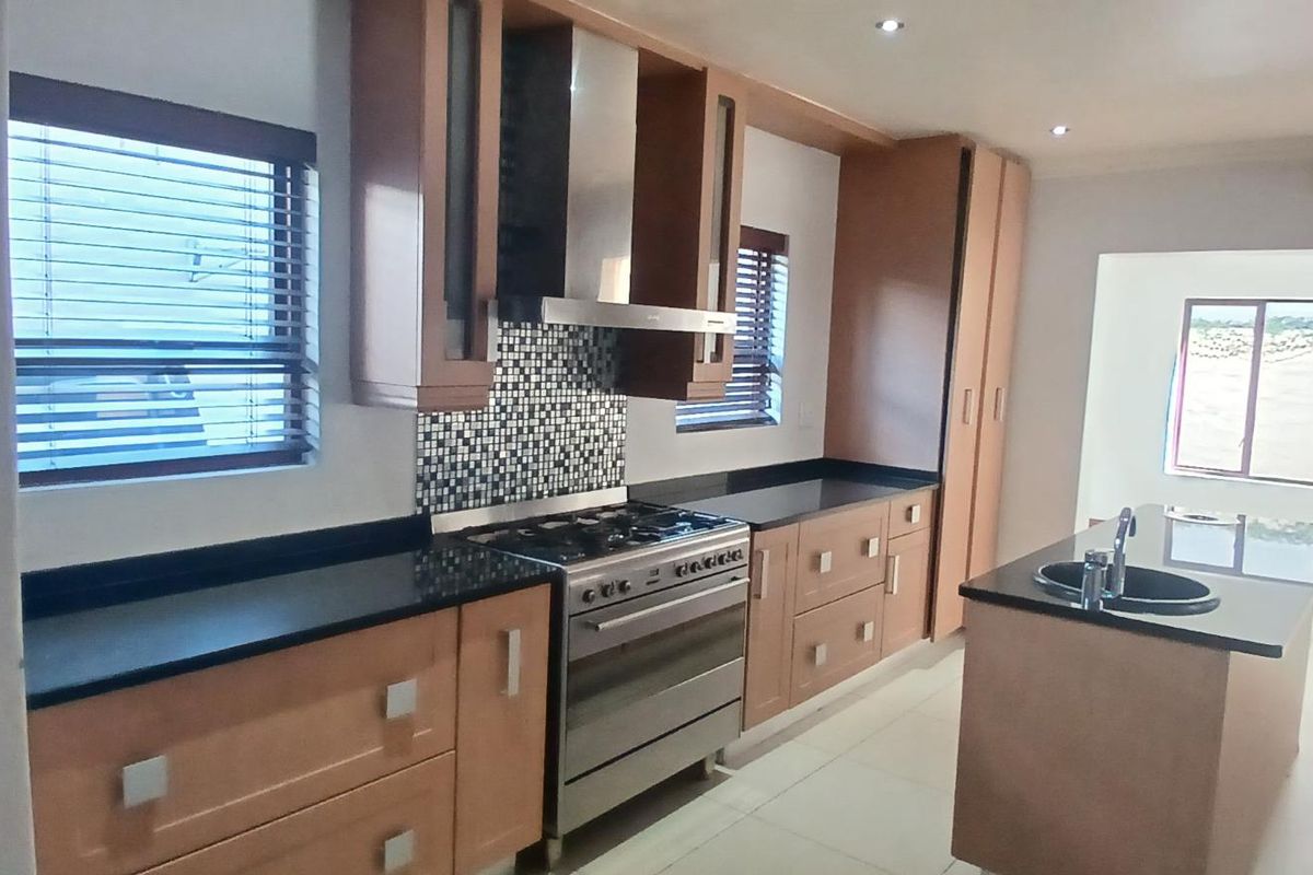 Modern Elegance in a Secure and Sought-After Estate - Photo 2