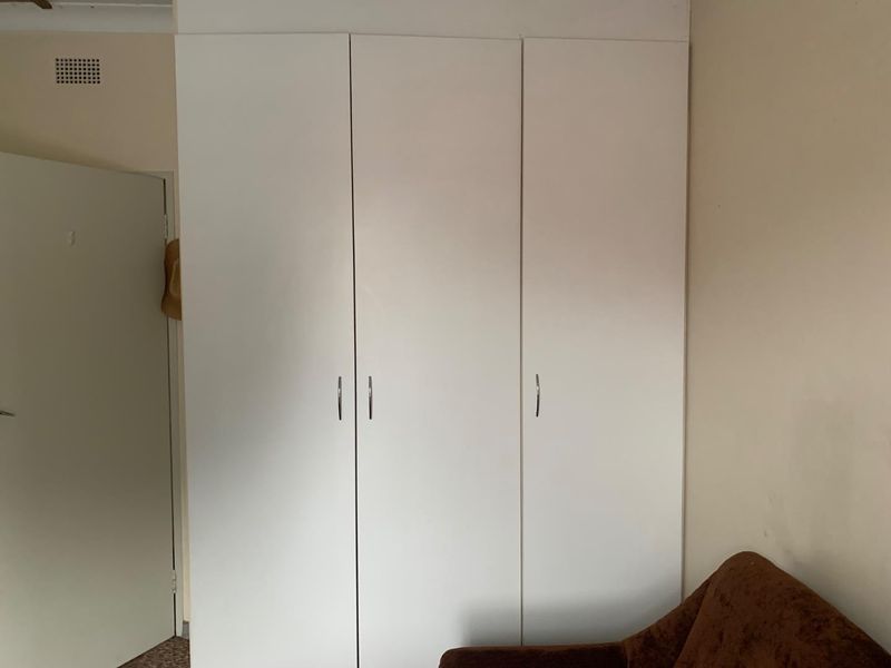 **Charming 3-Bedroom Home with Income Potential in a Tranquil Neighborhood** - Photo 8