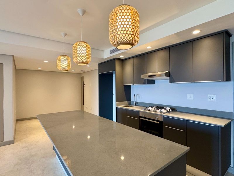 This is a premium, move-in-ready coastal apartment that combines luxury, security, and modern convenience in a sleek, never-before-lived-in space. - Photo 6