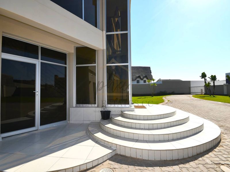 Exceptional Double-Story Beachfront Home with Unobstructed Sea Views - Photo 5