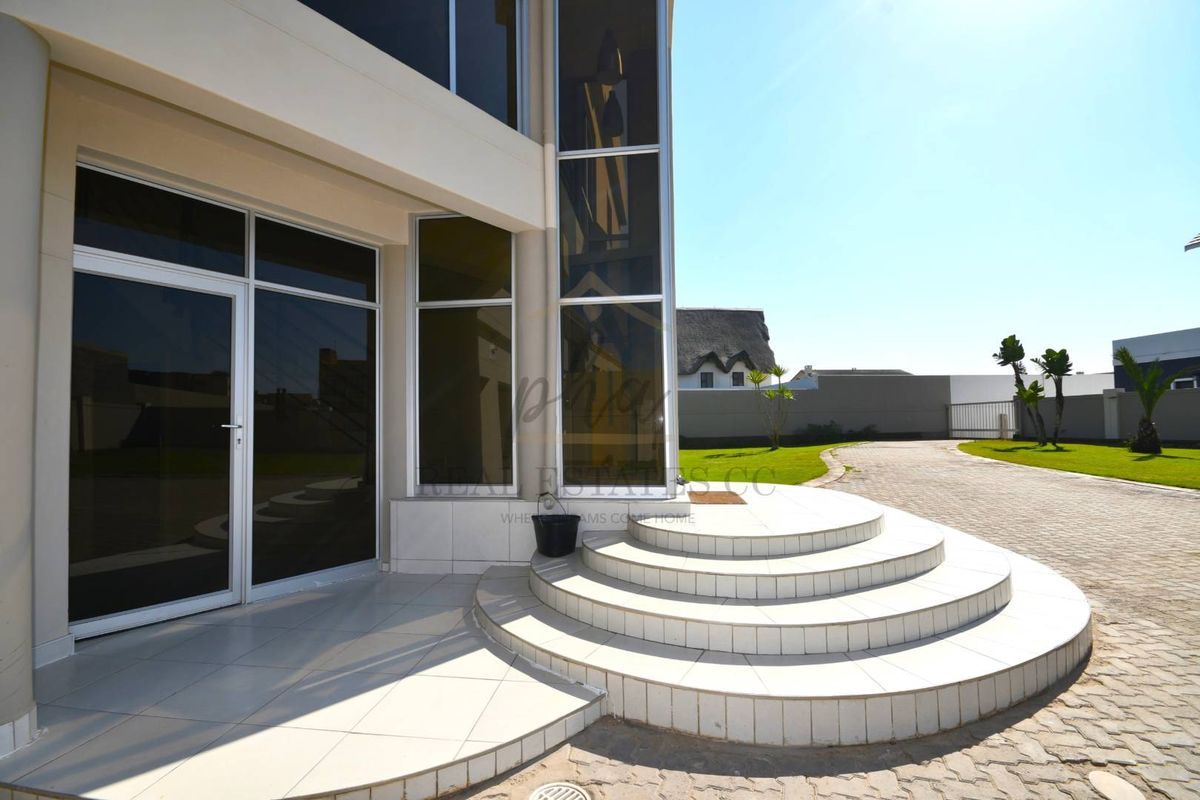 Exceptional Double-Story Beachfront Home with Unobstructed Sea Views - Photo 5