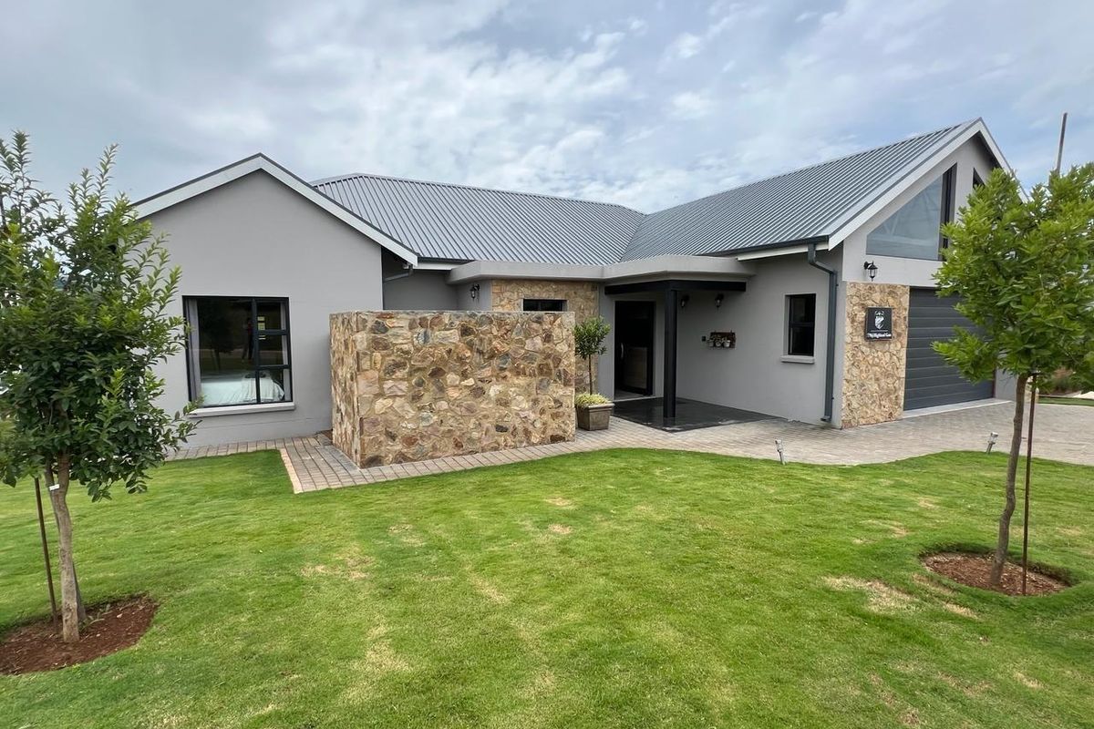 INCOME GENERATING HOME Welcome to this charming 4 bedroom home nestled within Highland Gate Golf Estate - Photo 2
