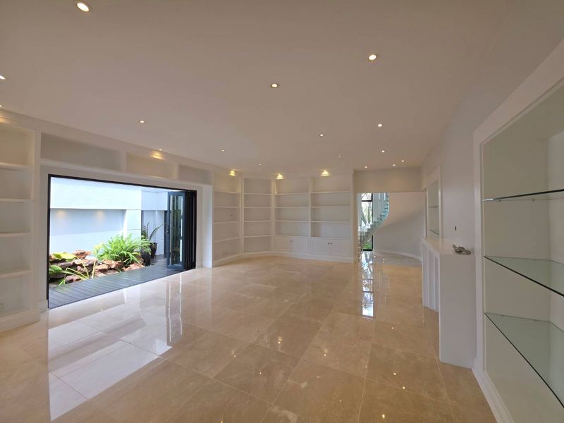 ​Freshly Renovated Masterpiece with Golf Course Frontage - Photo 8