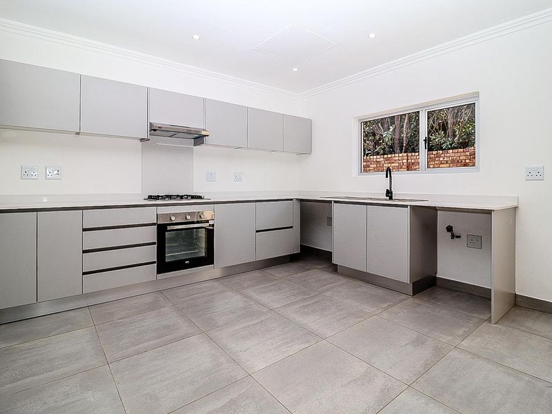 Modern Comfort Meets Secure Garden Living! - Photo 5
